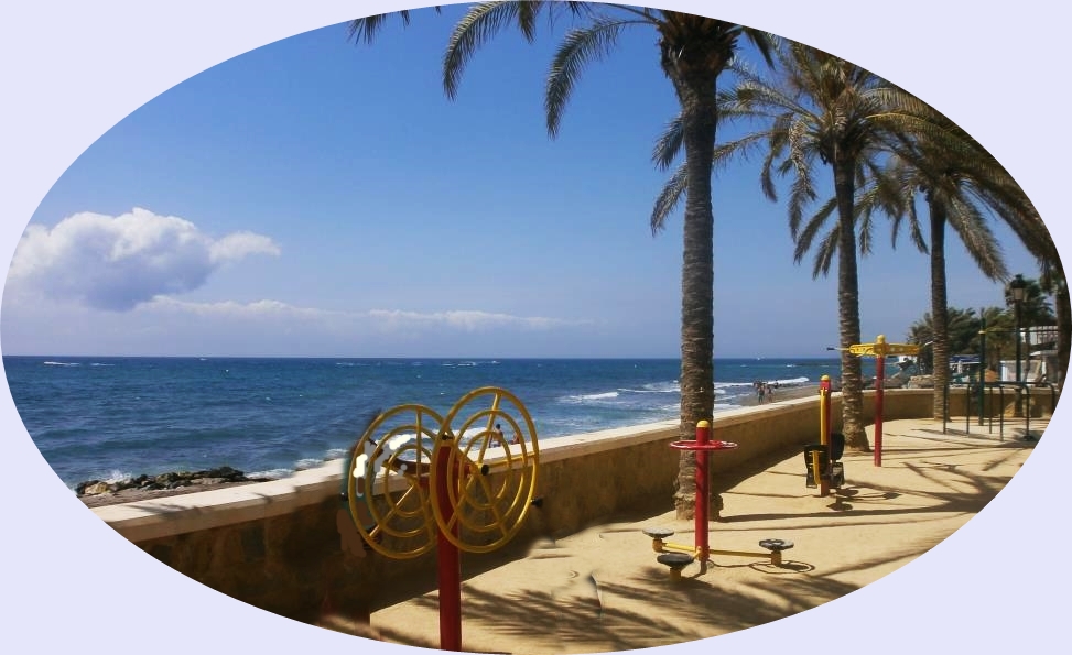 Bajadilla Beach playground with a nice ocean view behind, Marbella
