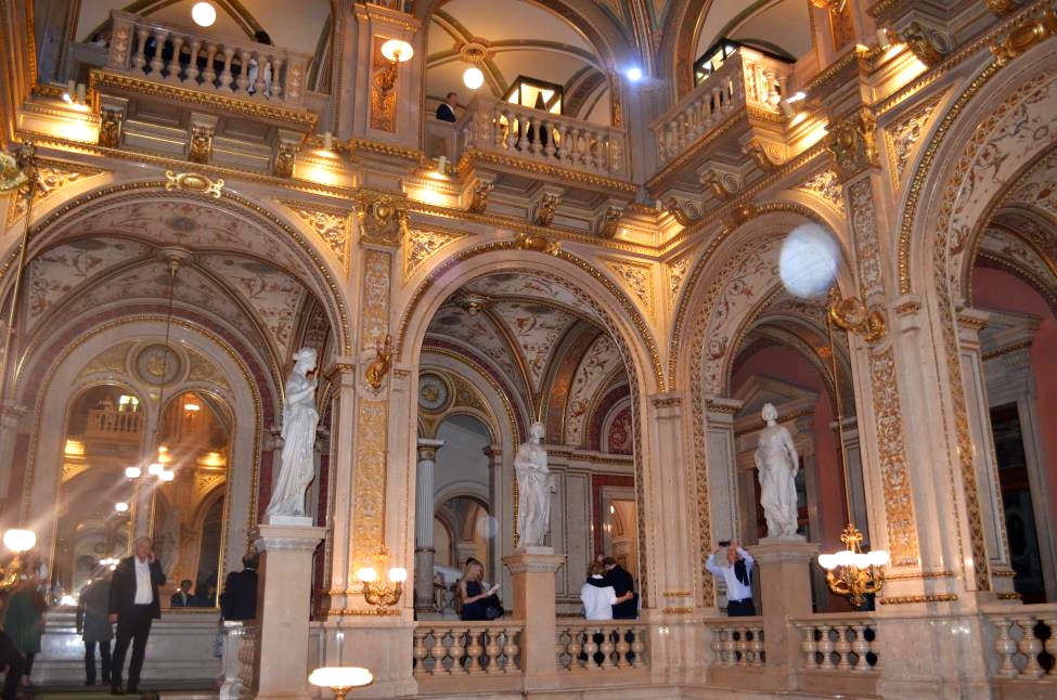 Fascinating interior decoration with statues, painted ceilings and arches, Vienna State Opera