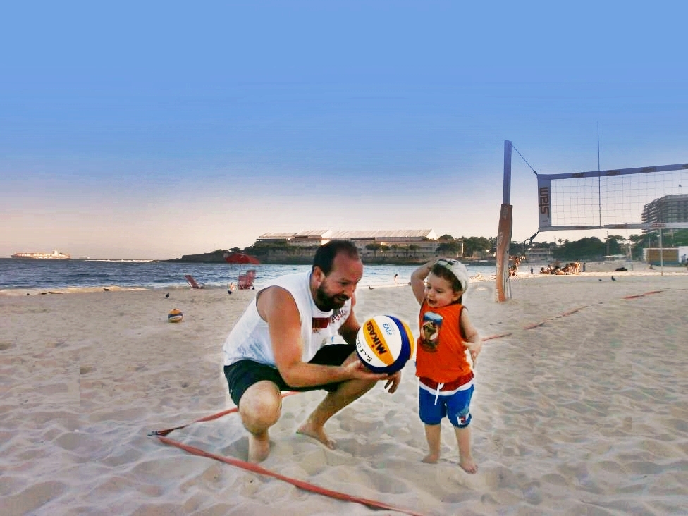 Jonnie and his son enjoying beach volleyball on Copacabana beach