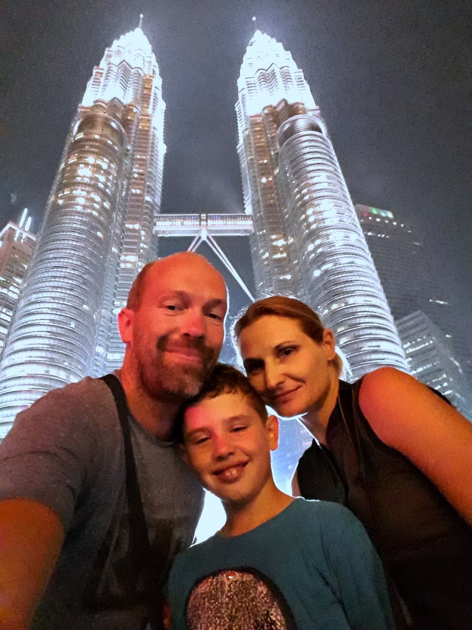 Family photo under the famous Petronas Towers