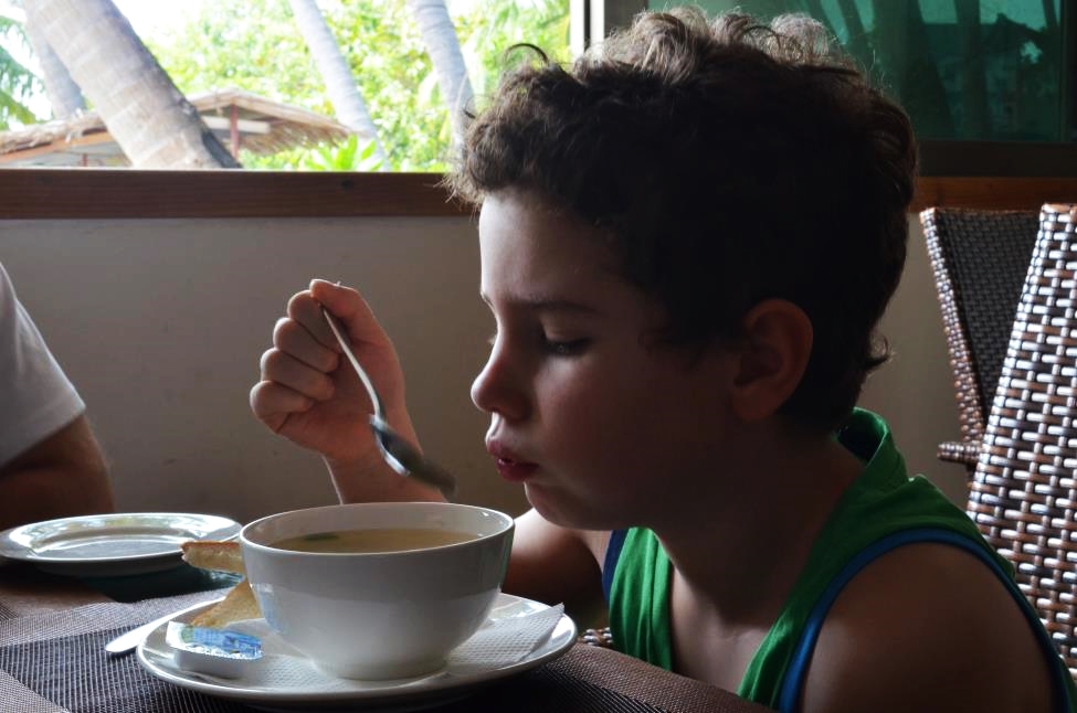 Mateja is tasting Maldivian soup