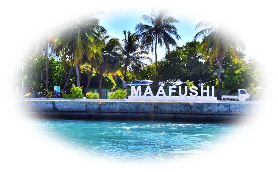 Welcome to Maafushi Island, Maldives. Maafushi inscription at the dock