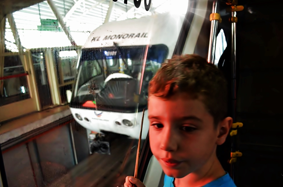 My son is excited for the Kuala Lumpur monorail experience while waiting for the train to arrive