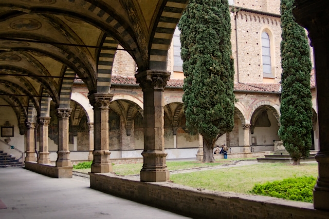 Green Cloister (Choistro Verde) with beautiful pointed arches and cypress trees
