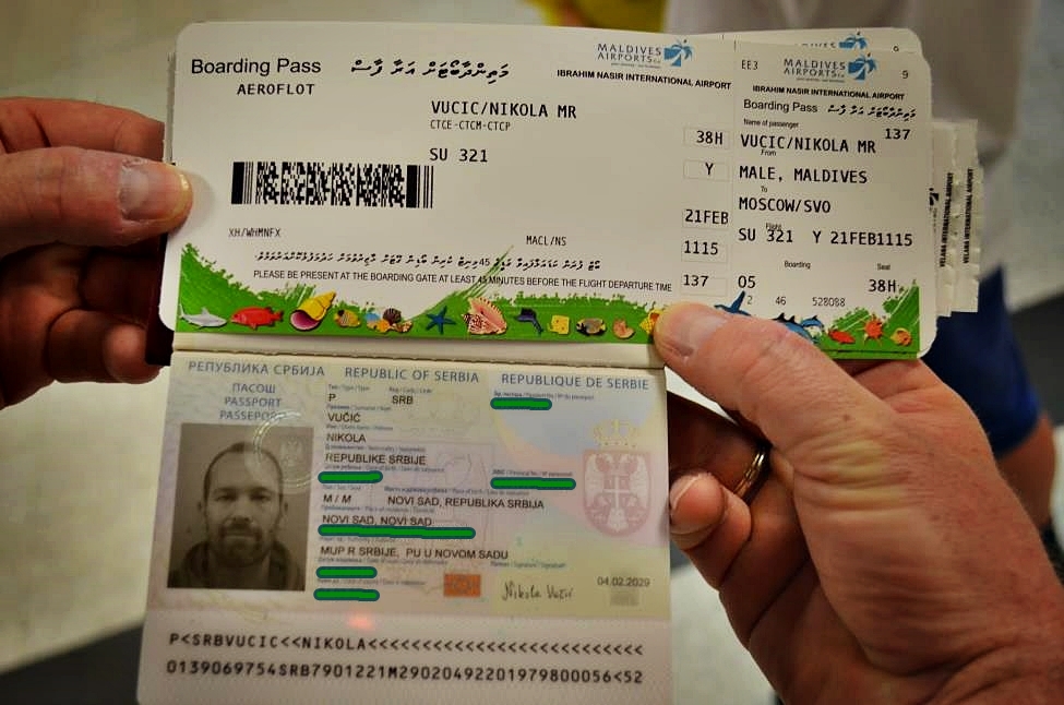 Passenger's passport and a flight ticket for Maldives