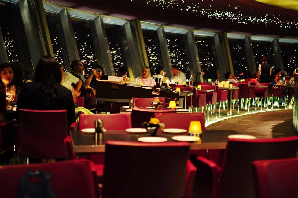 Fernsehturm Sphere Restaurant Dinner with elegant lights and people enjoying at their tables