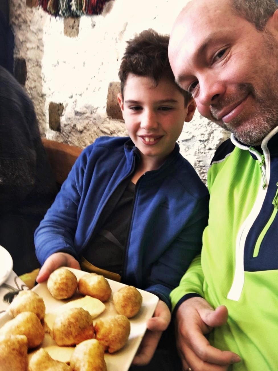 Yummy ustipci pastry with cottage cheese at Rajska Vrata Restaurant Jahorina. My son and I are enjoying